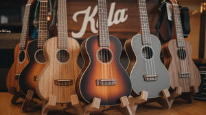 Lineup of Kala ukuleles in assorted finishes on display – best Kala ukuleles for every style and budge