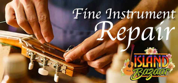 Hands repairing a wooden instrument, highlighting the best Ukulele pickups at Island Bazaar.