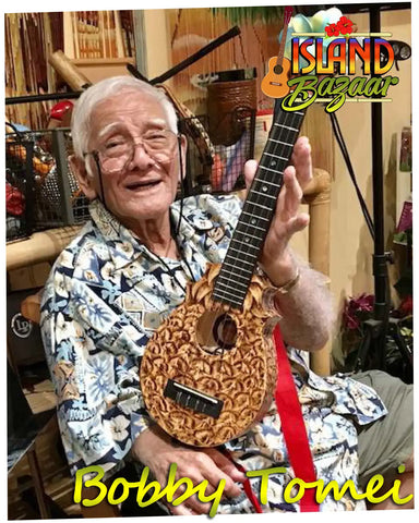 Ukulele with giraffe-print pattern at Friends of The Island Bazaar Online Ukulele Shop