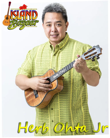 Musician in a lime green shirt performing ukulele, inspired by Aldrine Guerrero.