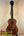 Brown KoAloha KTM-00 Tenor Ukulele with black fretboard for authentic Hawaiian sound