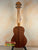 Wooden back of KoAloha KTM-00 Tenor Ukulele showcasing authentic Hawaiian craftsmanship