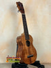 Wooden Kamaka Soprano Ukulele HF-1 showcasing rich solid Koa wood grain pattern