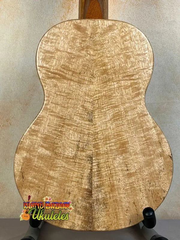 Acoustic guitar back panel of figured maple on KoAloha KTM-00 Mango Tenor Ukulele