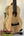Wooden KoAloha KTM-00 Mango Tenor Ukulele showcasing curly maple grain pattern