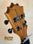 Guitar headstock with black tuning pegs on Beautiful KoAloha KTM-00 Mango Tenor Ukulele