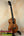 Wooden KoAloha KTM-00 Tenor Ukulele on stand with solid Hawaiian koa and authentic Hawaiian sound