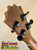 Ukulele headstock with tuning pegs of the KoAloha KTM-00 Tenor in solid Hawaiian koa