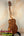 Wooden KoAloha KTM-00 Tenor Ukulele on stand with authentic Hawaiian sound and solid Hawaiian koa