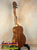 Wooden KoAloha KTM-00 Tenor Ukulele on stand with authentic Hawaiian sound and solid Hawaiian koa