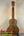 Wooden KoAloha Opio Concert Ukulele with natural grain finish and dark fretboard