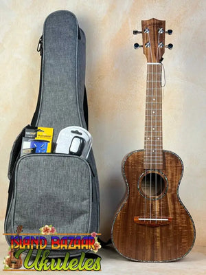 Beautiful Concert Acacia Ukulele with dark wood grain finish from Southern California retail