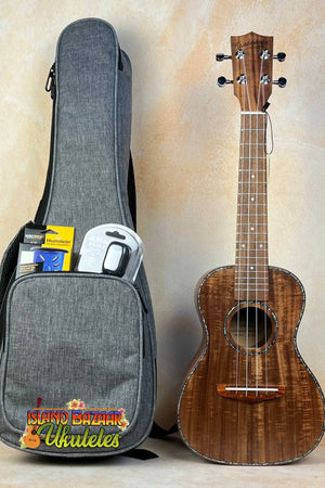 Beautiful Concert Acacia Ukulele with dark wood grain finish from Southern California retail