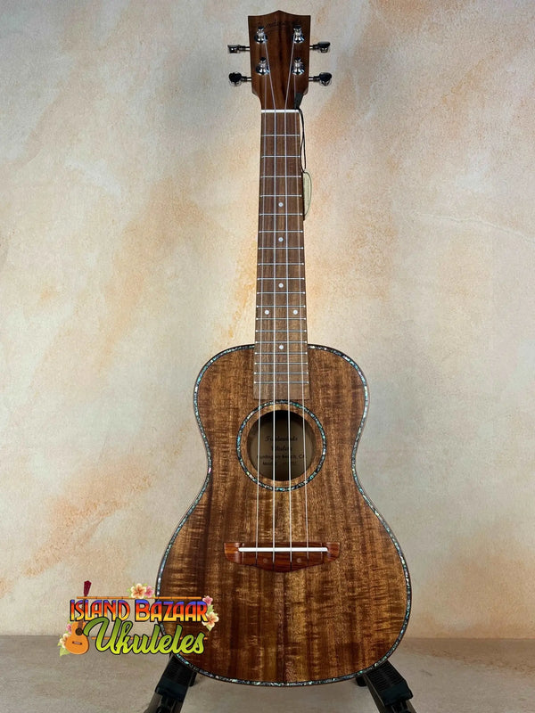 Beautiful koa wood Concert Acacia Ukulele with natural finish in beginners bundle