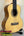 Natural wood Flight Sophia Soundwave Tenor Uke on a black stand with gig bag