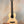 Natural wood acoustic guitar with a light body and dark neck for Flight Voyager Tenor