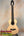 Natural wood acoustic guitar with a light body and dark neck for Flight Voyager Tenor
