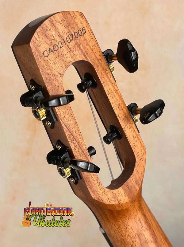 Wooden guitar headstock with black tuning pegs on Flight Voyager Tenor Ukulele