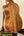 Wooden acoustic guitar with rich grain patterns beside the Exquisite KoAloha KSM-00 Soprano Ukulele