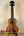 Wooden Soprano Ukulele with Dark Fretboard on Stand, Experience the Exquisite KoAloha KSM-00
