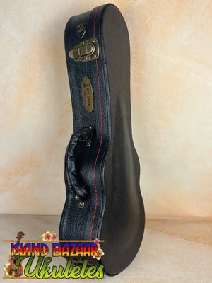 Black hardshell violin case with brass hardware and red trim for the Exquisite KoAloha KSM-00
