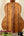 Wooden acoustic guitar showcasing unique grain, ideal for the Exquisite KoAloha KSM-00