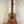 Wooden tenor ukulele with dark fretboard, featured in Flight Acoustic-Electric Baritone Uke