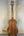 Wooden Flight Acoustic-Electric Baritone Uke Soundwave with natural finish and black pegs