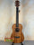Wooden tenor ukulele with dark fretboard, featured in Flight Acoustic-Electric Baritone Uke