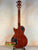 Mahogany-colored electric guitar with black hardware in Flight Centurion VB Tenor