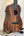 Wooden Flight Juliana Acacia Concert Ukulele with dark brown grain and black tuning pegs