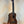 Wooden Flight Juliana Acacia Concert Ukulele with dark grains and black strings