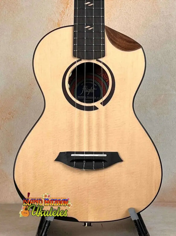 Natural wood tenor ukulele with black binding and cutaway design, Flight Victoria Tenor EQ-A