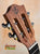 Wooden guitar headstock with tuning pegs on Flight Victoria Tenor EQ-A Ukulele