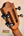 Wooden guitar headstock with black tuning pegs on Flight Victoria Tenor EQ-A Uke