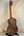 Wooden Flight Victoria Tenor EQ-A ukulele showcasing wood grain and dark binding