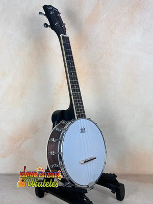 Gold Tone Concert-Scale Banjolele with Hardshell Case on black stand showcasing plate-style resonator
