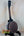 Gold Tone Concert-Scale Banjolele with Hardshell Case resting on a black stand