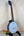 Gold Tone Tenor-Scale Banjolele with case, featuring black rim and plate-style resonator