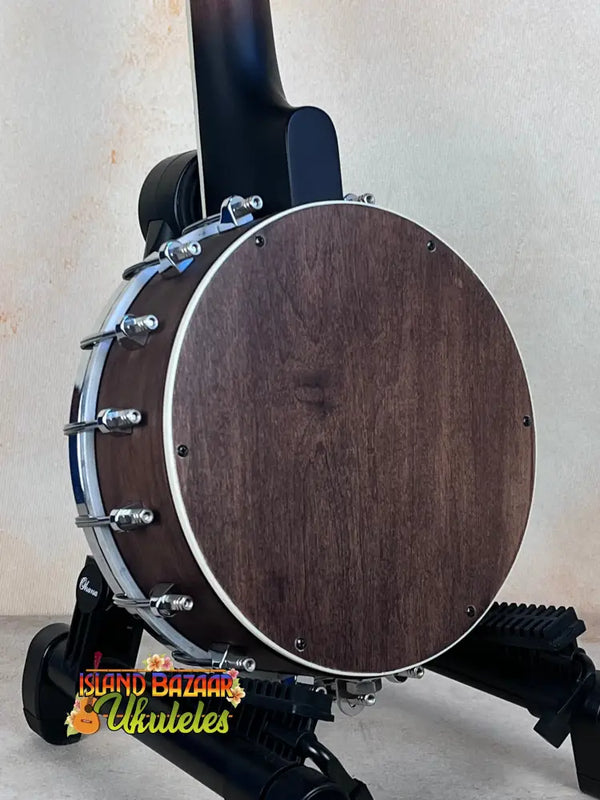 Dark wooden Gold Tone Tenor-Scale Banjolele with metal hardware and tuning pegs