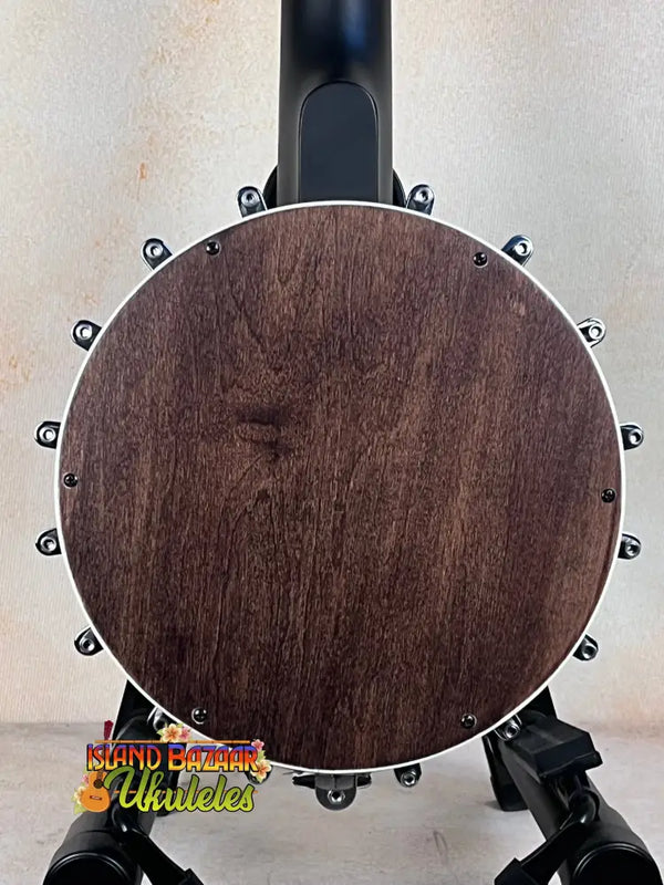 Dark wooden back of Gold Tone Tenor-Scale Banjolele with metal tension hooks