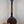 Dark wooden Gold Tone Tenor-Scale Banjolele with metal hardware and tuning pegs