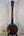 Dark wooden Gold Tone Tenor-Scale Banjolele with metal hardware and tuning pegs