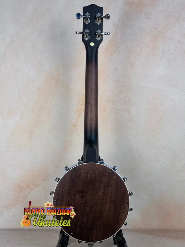 Dark wooden Gold Tone Tenor-Scale Banjolele with metal hardware and tuning pegs