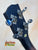 Guitar headstock with blue-tipped tuning pegs from Gold Tone Tenor-Scale Banjolele