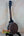 Wooden Gold Tone Tenor-Scale Banjolele with dark finish and metal hardware