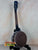 Wooden Gold Tone Tenor-Scale Banjolele with dark finish and metal hardware