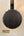 Dark wooden banjo back with metal hooks from Goldtone Concert Banjolele Maple Rimmed