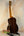 Wooden baritone ukulele with dark rosewood back, showcasing Ohana TK-50G design
