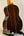 Classical acoustic guitar featuring dark striped wood back and sides with Ohana TK-50G